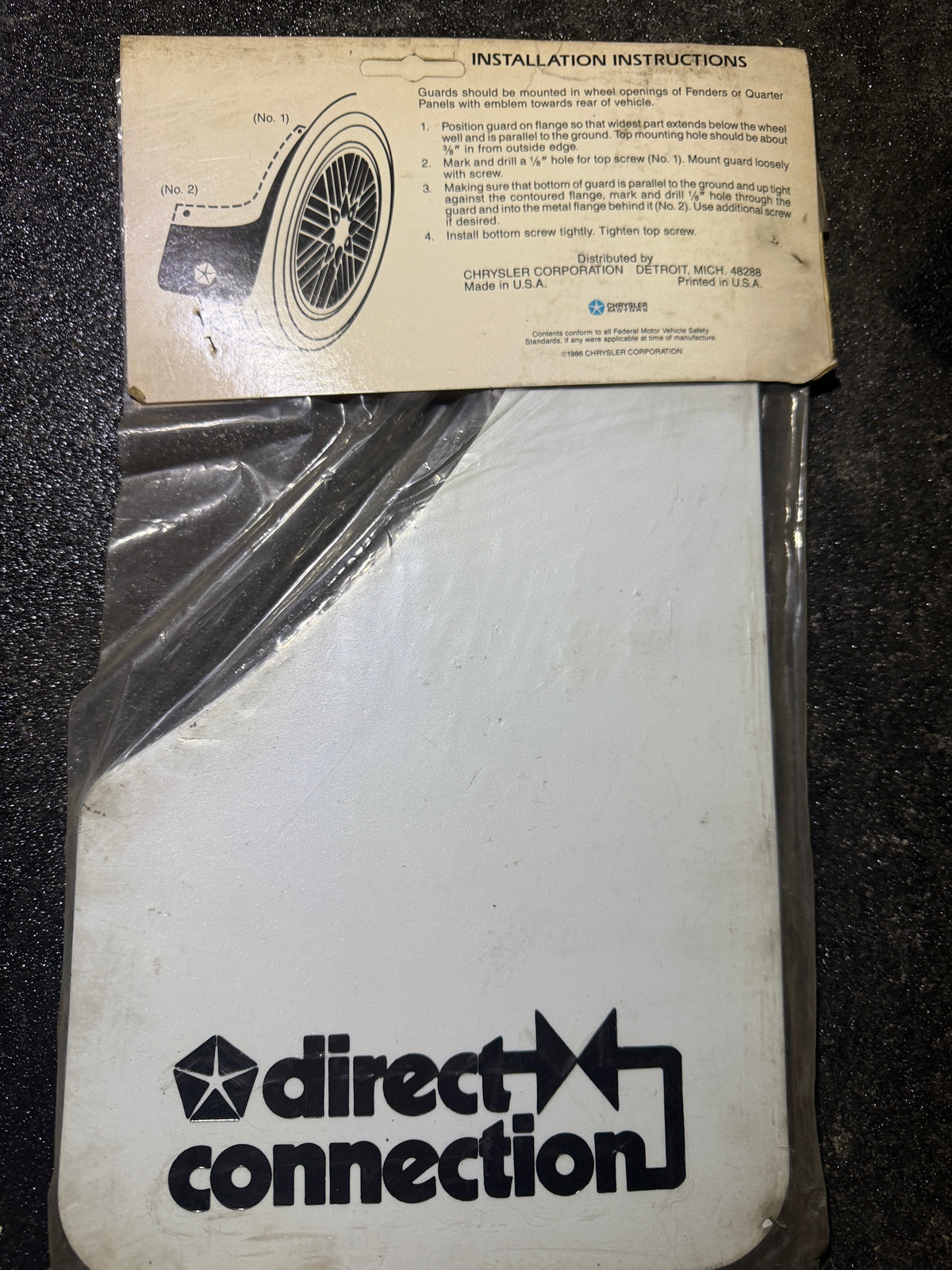 P4286199- NOS Direct Connection splash guards, 1980s Mopar